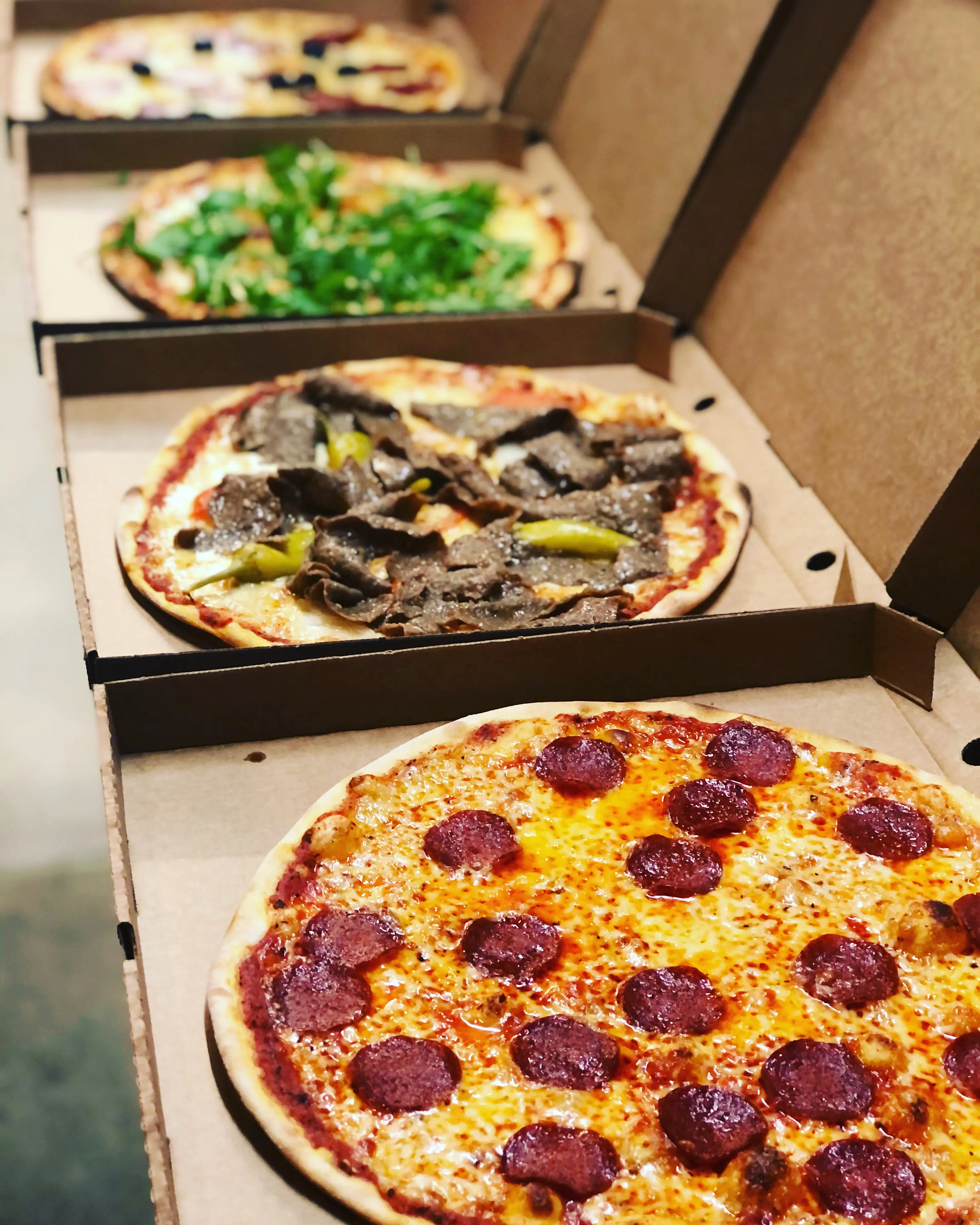 Pizzor i lådor